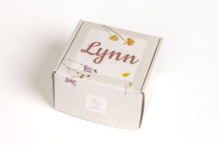 Green lemon spa gift box with glass scented candle, two shower steamers, and sleeping eye mask — view 2