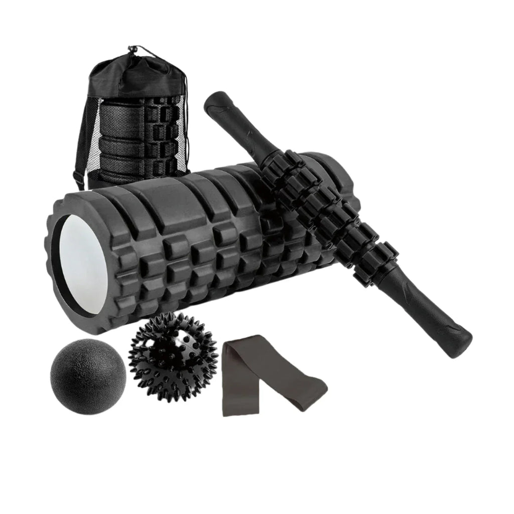 Black 6-in-1 yoga training set with foam roller, massage stick, tension band, and massage balls
