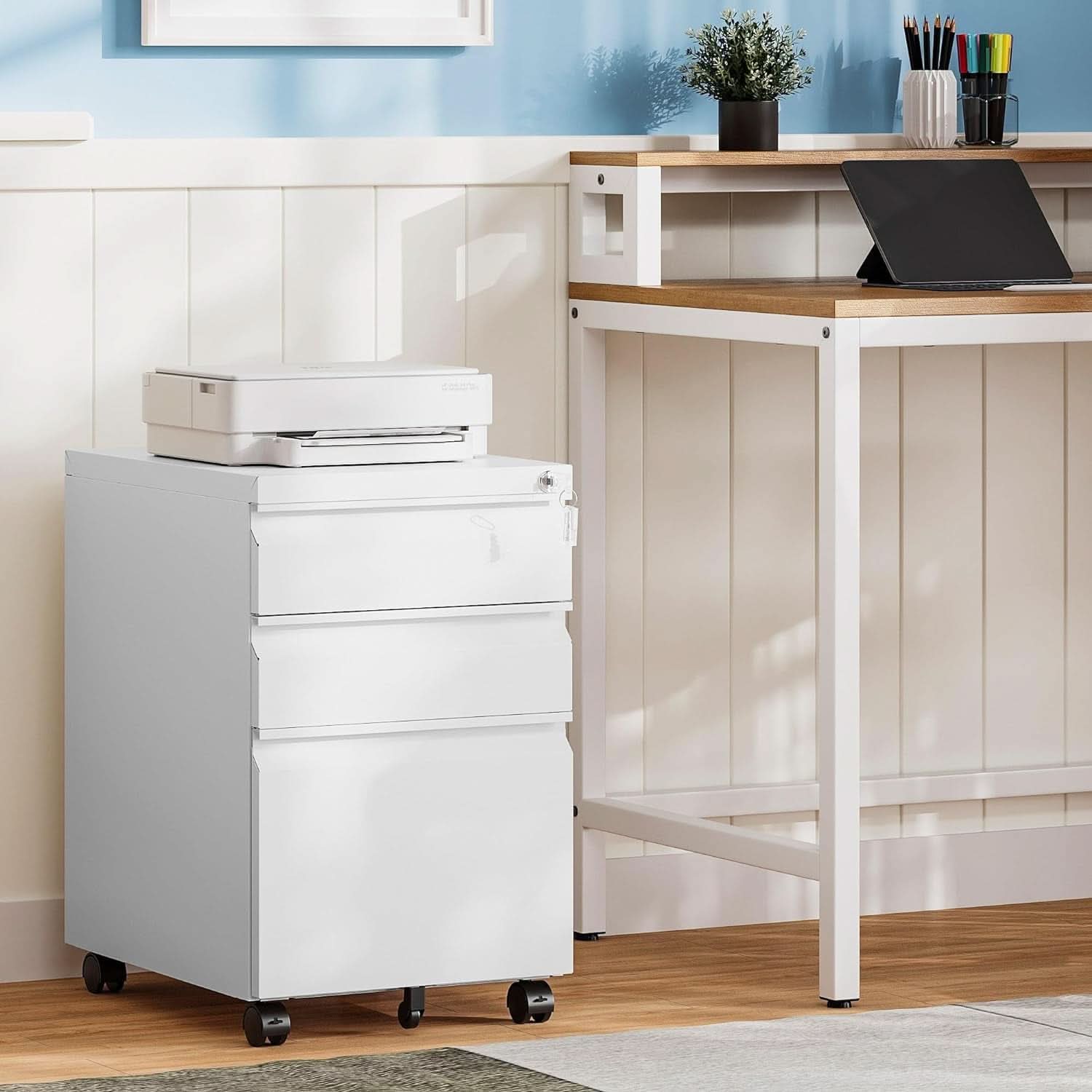 White 3-drawer mobile filing cabinet in solid steel with caster wheels — view 2