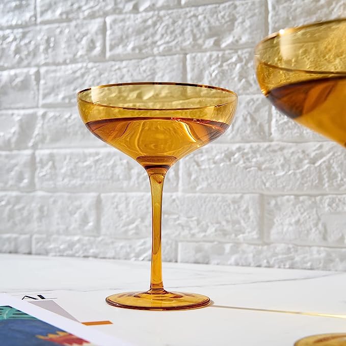 Sunset yellow coupe glasses with elegant gold rims and bubble texture for champagne and cocktails — view 3