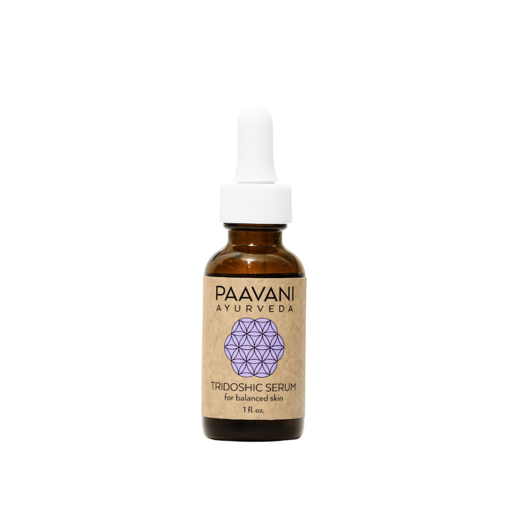 Tridoshic face serum in an earth-friendly amber glass bottle with a dropper cap — view 2