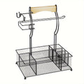 Black metal grill caddy organizer with condiment compartments and a built-in paper towel holder