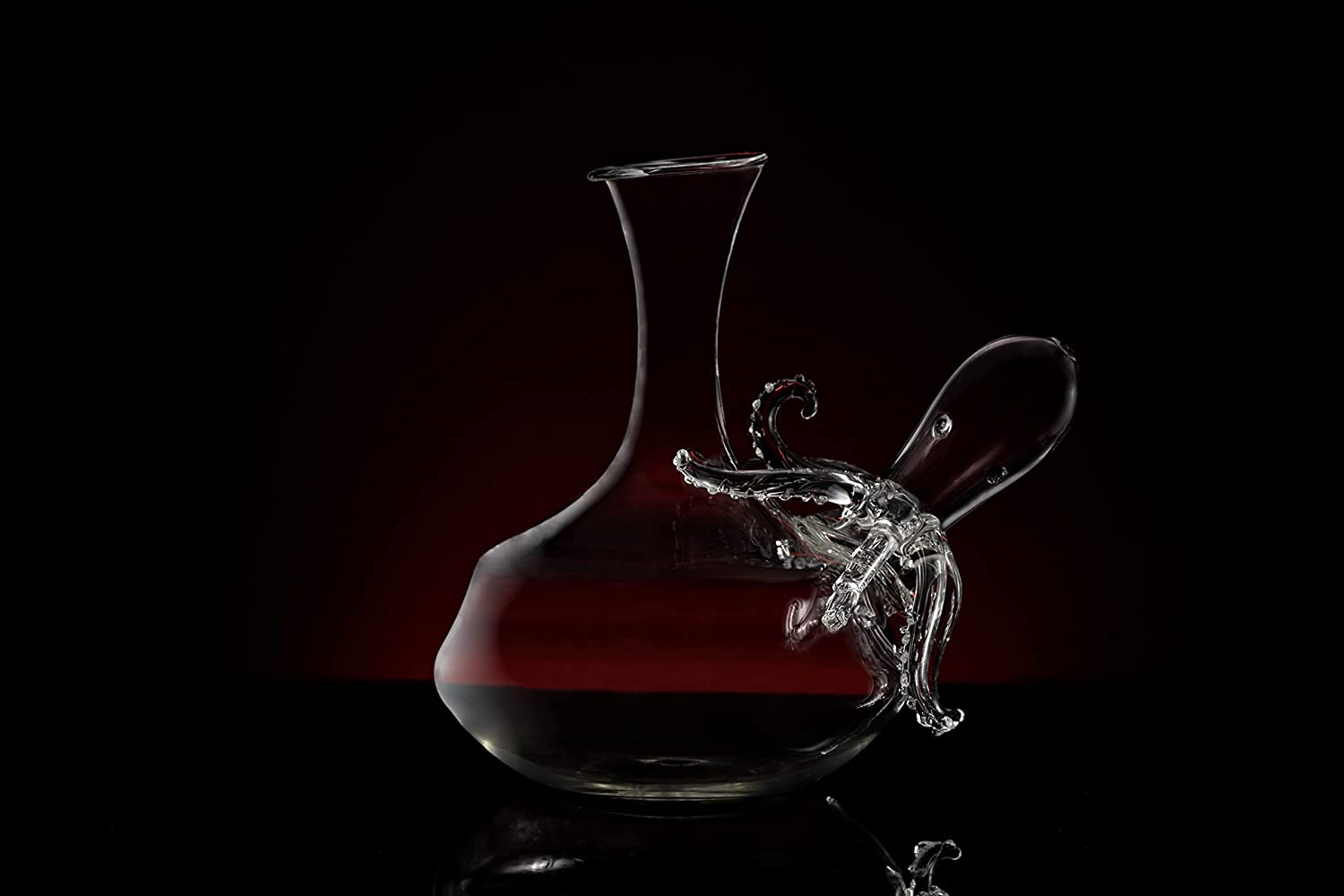 Clear blown glass octopus whiskey decanter with detailed tentacles and integrated pouring spout — view 5