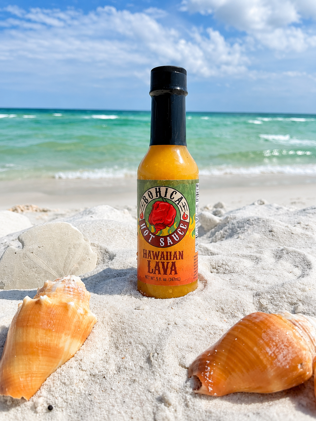 Bottle of Bohica Hawaiian Lava hot sauce with a blend of tropical fruits and spicy peppers
