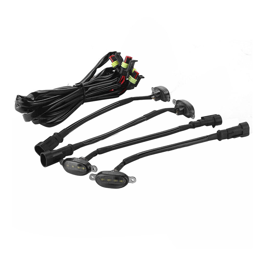 Four piece smoked lens white LED truck grille running lights with included wiring harness setup