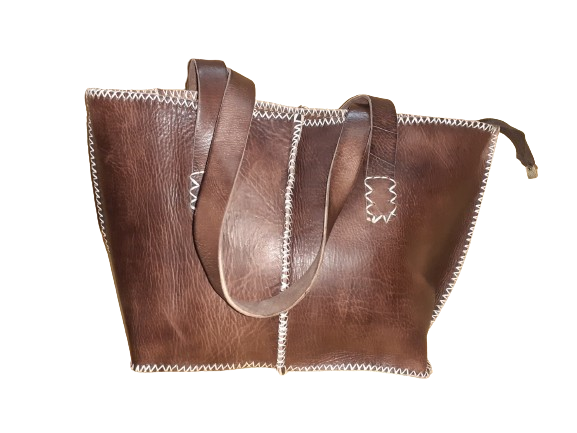 Medium rectangular rustic cowhide leather handbag with white stitching and sturdy dual handles. — view 4