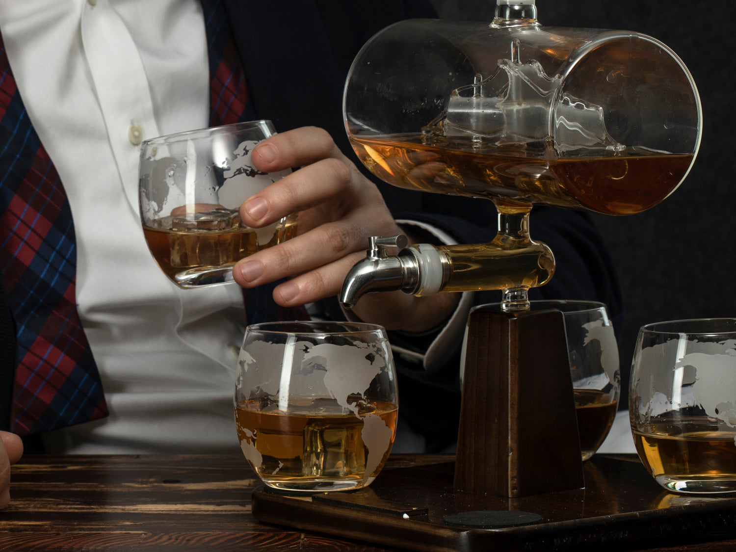 Hand-blown glass ship whiskey decanter with 1000ml capacity on a mahogany wood display base — view 2