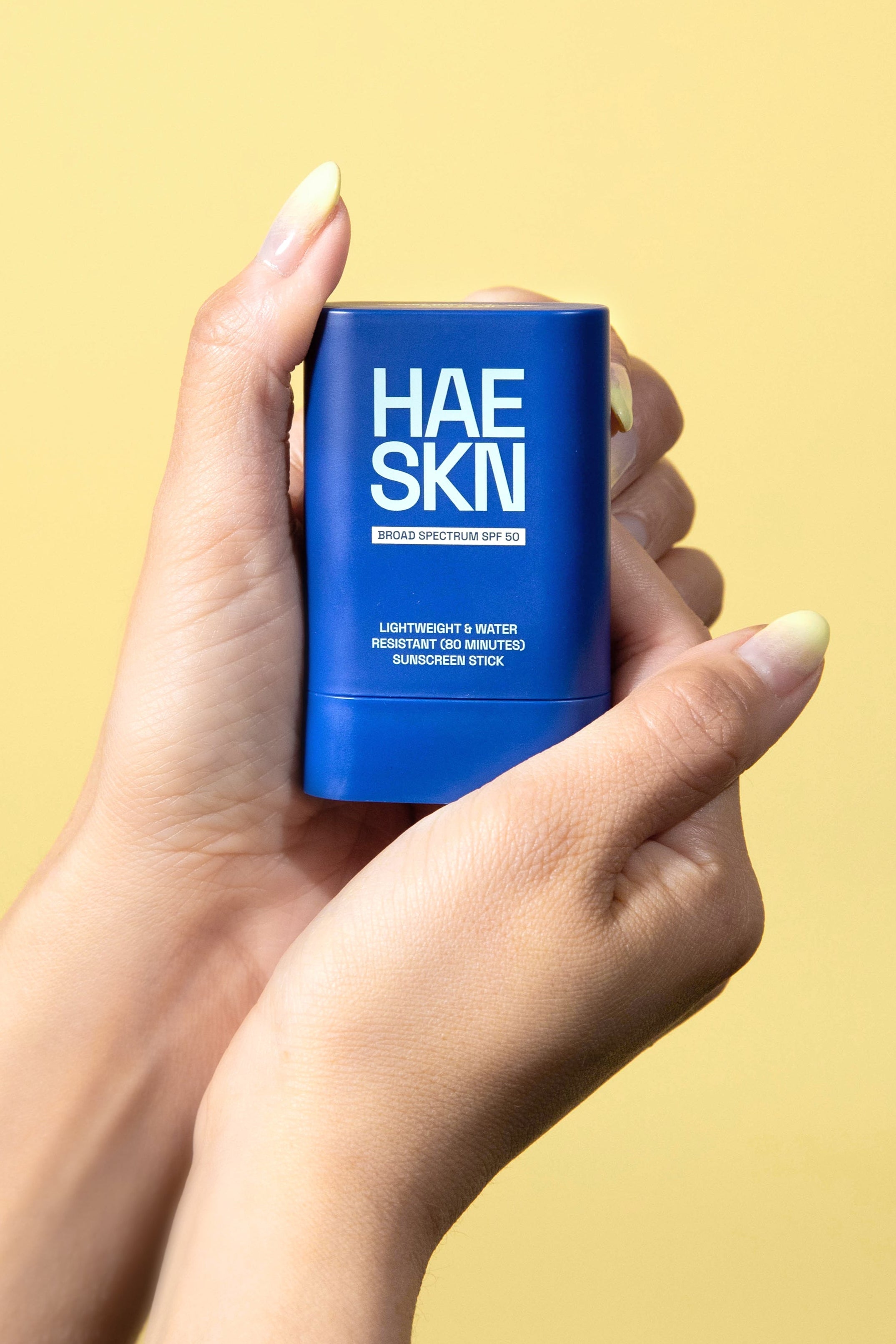 HAESKN Sunscreen Stick SPF 50, a compact portable sun care applicator for daily facial protection. — view 2