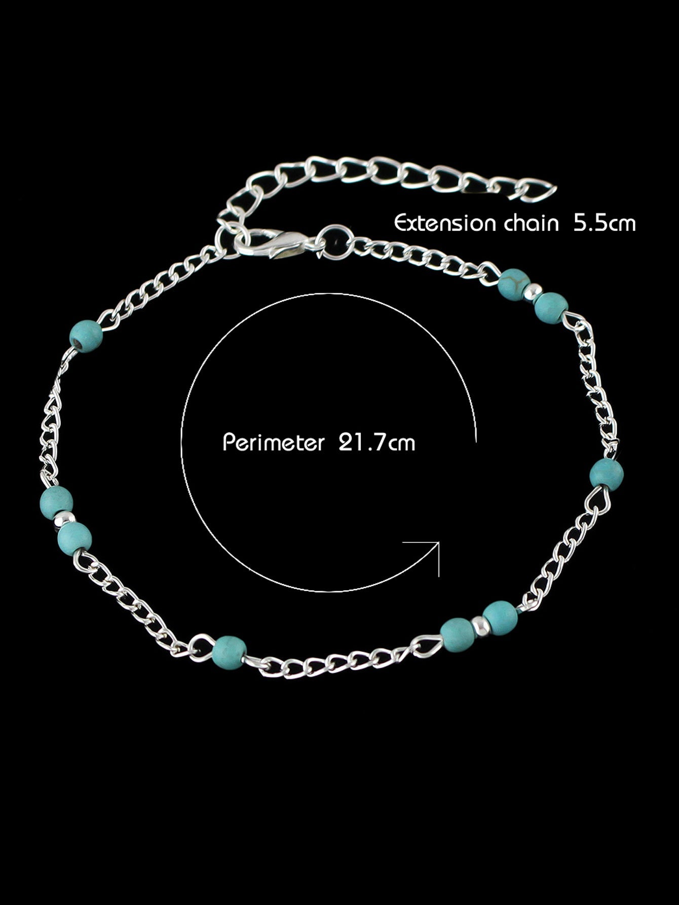 Boho chic turquoise barefoot sandal anklet with delicate silver chains draped gracefully over a foot — view 5