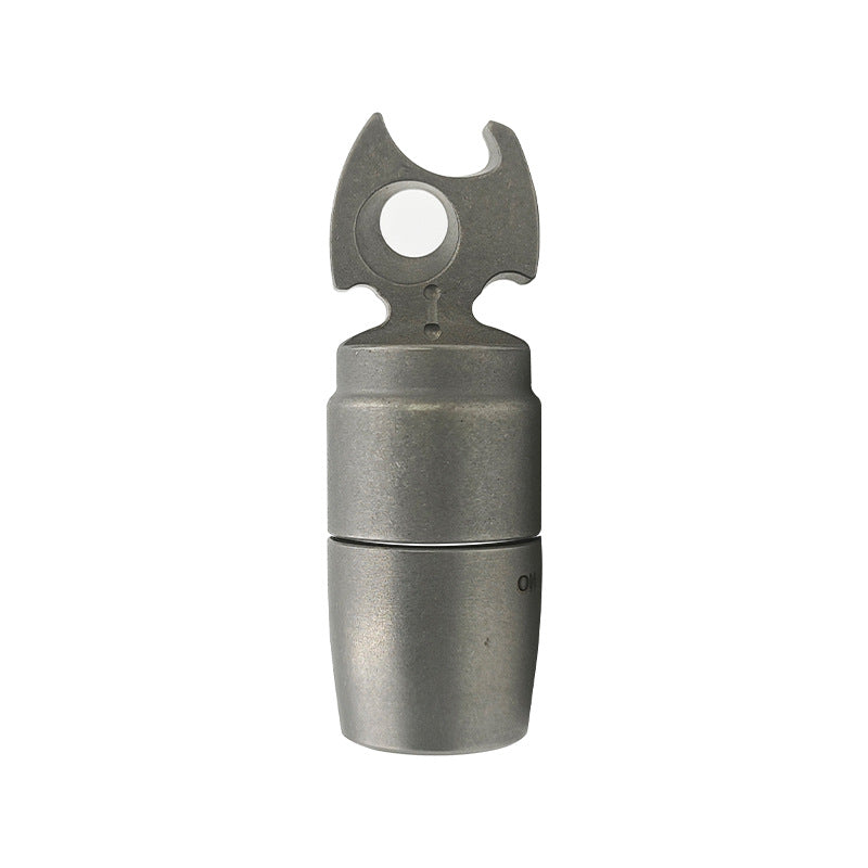 Titanium EDC keychain flashlight with integrated bottle opener attached to metal keyring on plain background — view 5