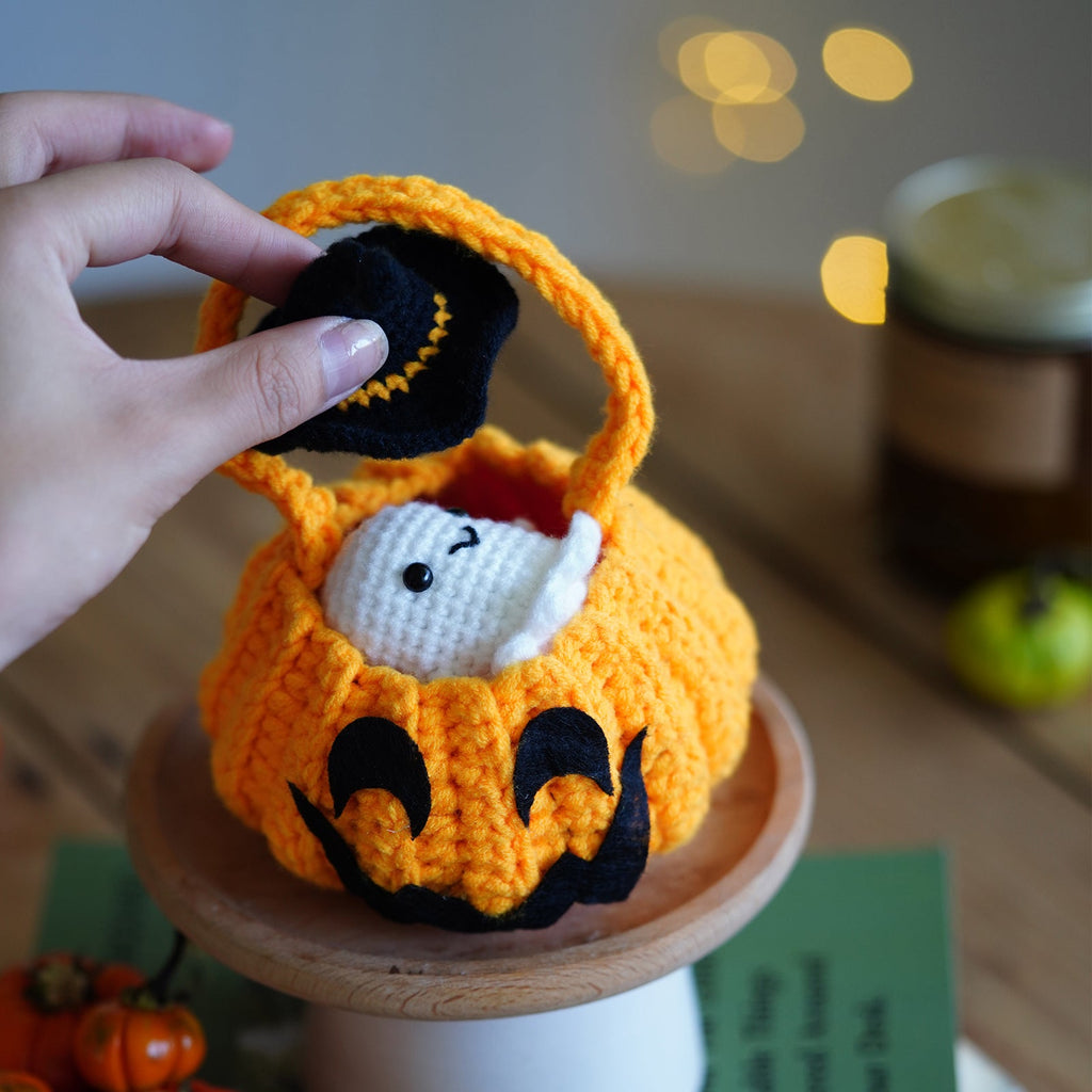 Halloween amigurumi crochet kit featuring a finished yarn pumpkin and cute little ghost plush figures — view 3