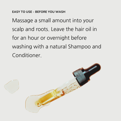 Pure organic hair oil in a 50mL amber glass bottle with a minimalist label — view 5