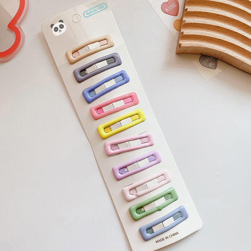 Colorful metal baby hair clip set in a magical pastel color palette. — view 2