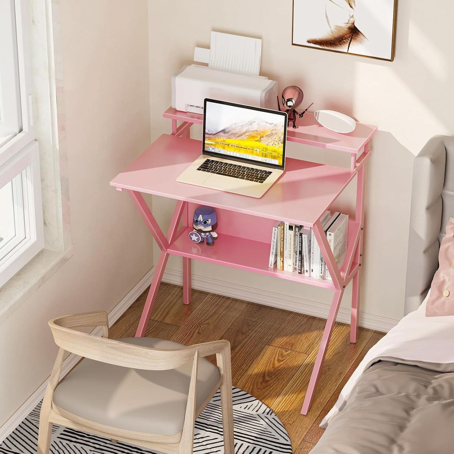 Compact 27.5-inch pink computer desk with elevated monitor stand and lower storage shelf — view 2