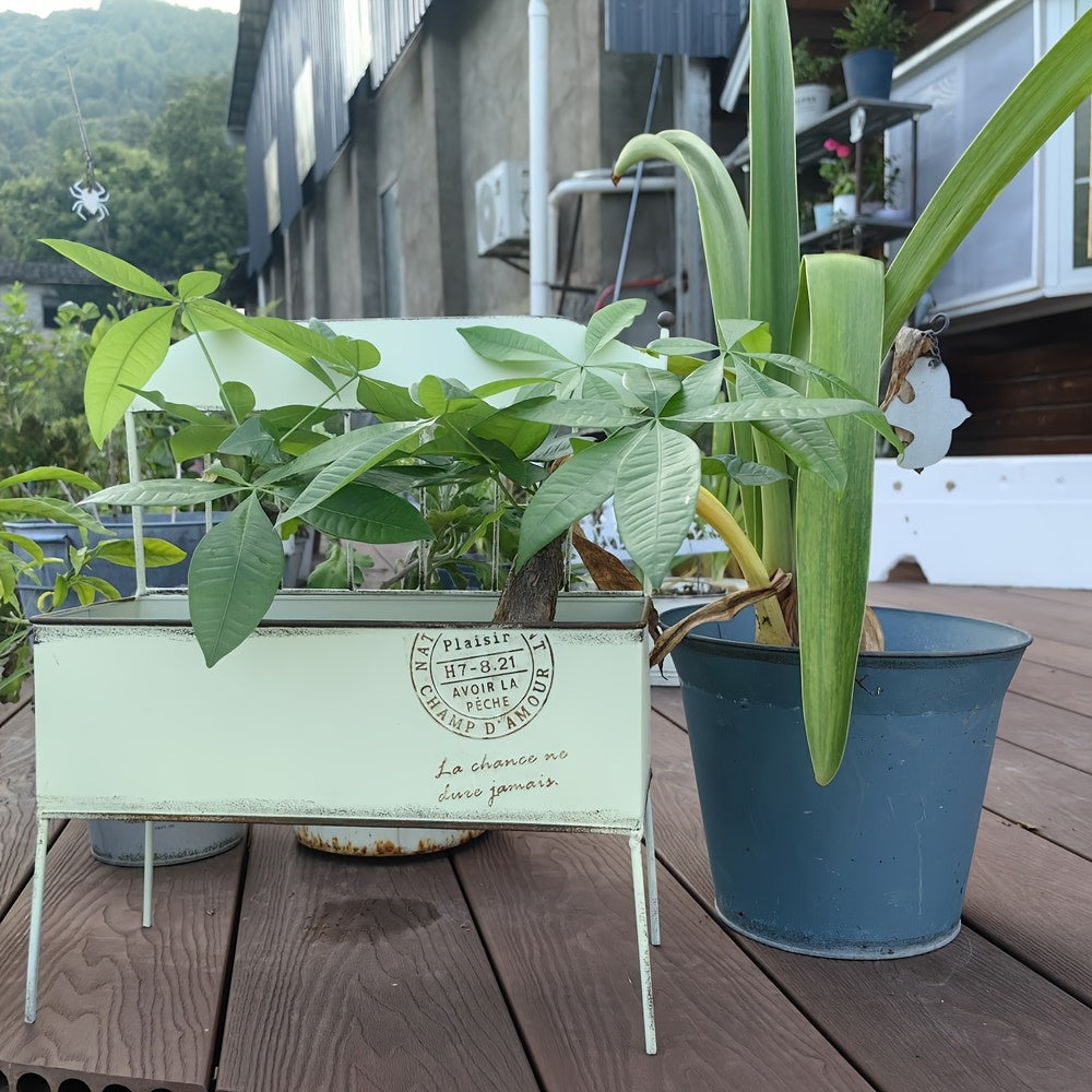 Vintage chair garden planter in cream metal with a square wooden base and built-in drainage — view 4