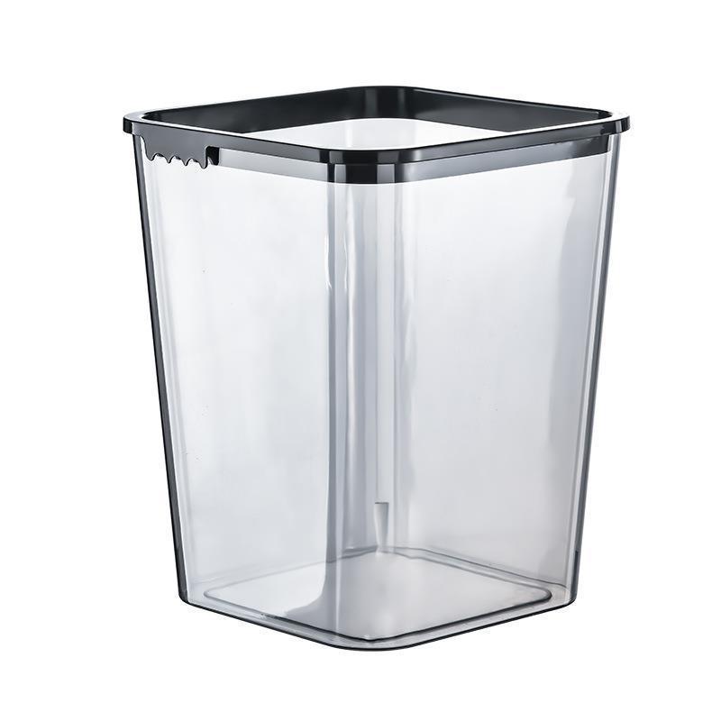 Transparent square waste bin with internal press-ring mechanism, shown empty on a white background. — view 4