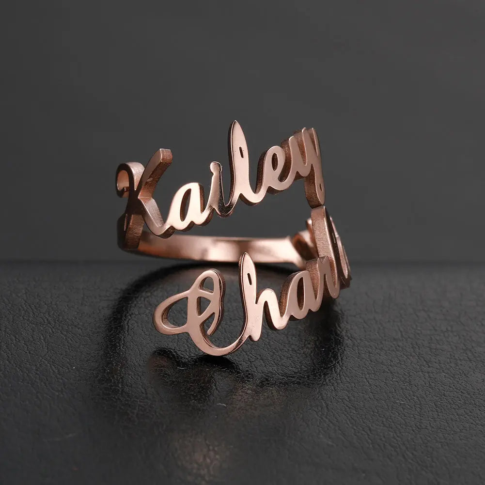 Personalized custom name ring in polished 18k gold featuring delicate cursive typography styling — view 4