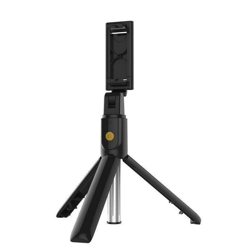Wireless Bluetooth selfie stick tripod fully extended with smartphone mount and remote control attached — view 2