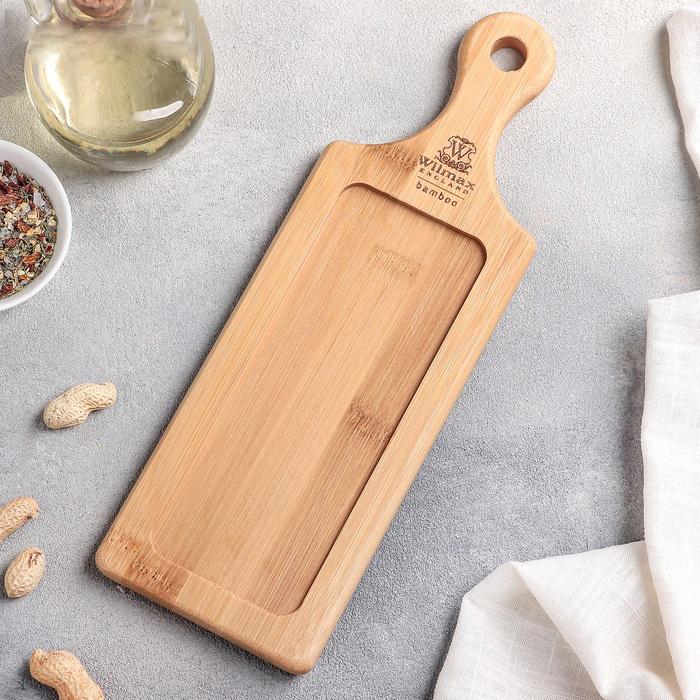 Natural bamboo rectangular serving tray with an integrated handle for serving appetizers and barbecue sliders