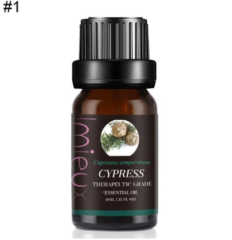 Small 10ml glass bottle of pure aromatherapy essential oil for spa massage and stress relief — view 3