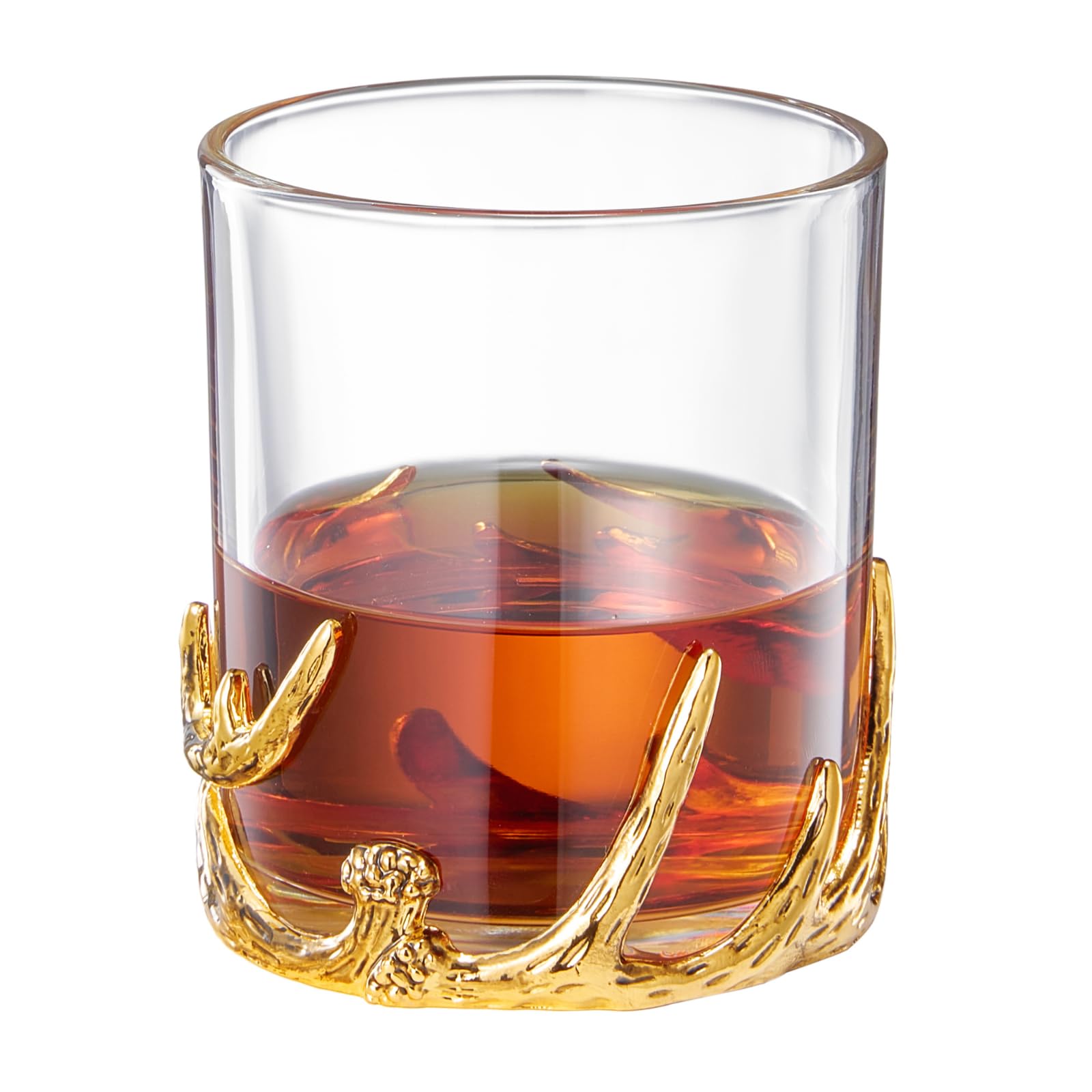 Clear double old fashioned whiskey glass resting on an intricate gold antler style base