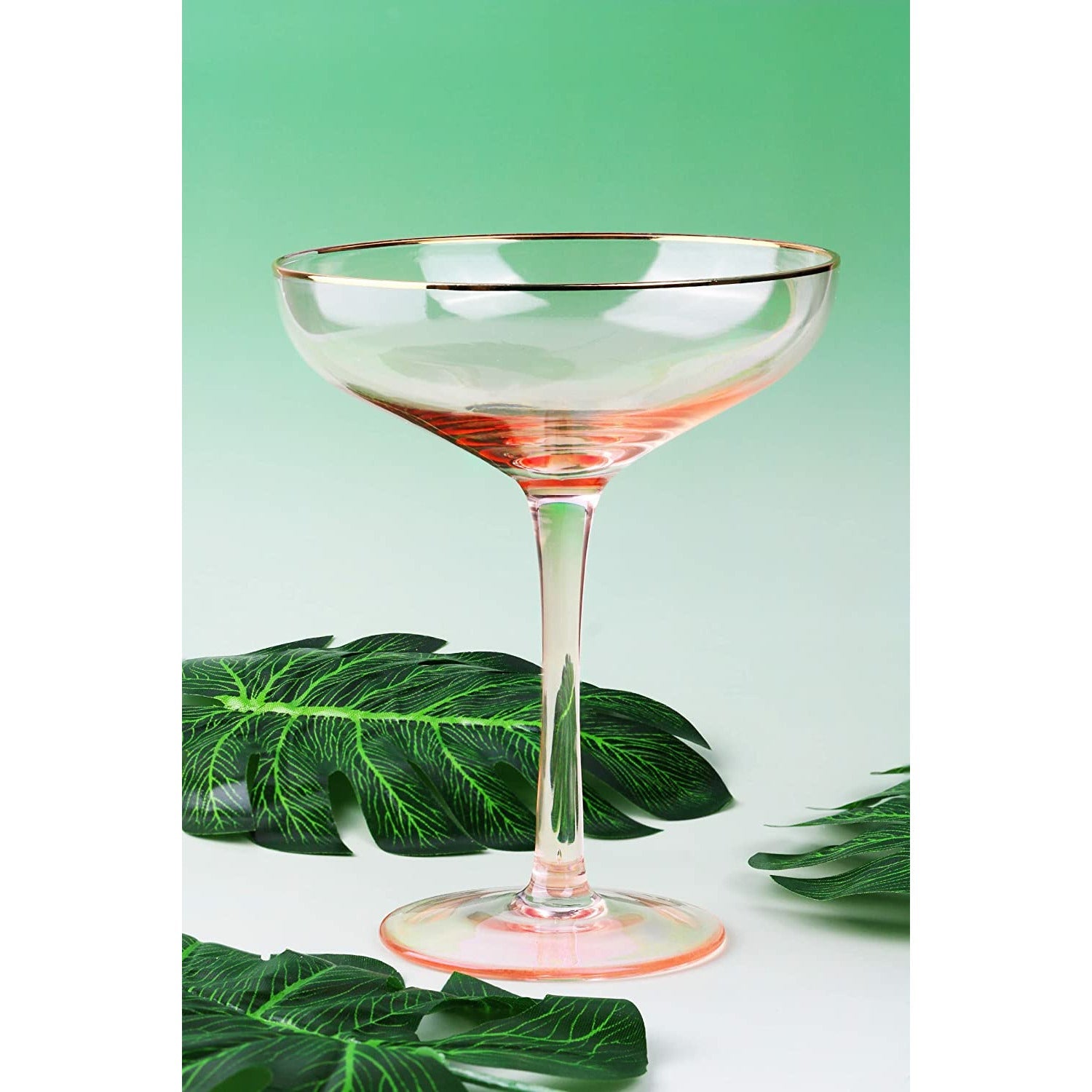 Set of two blush pink stemless coupe glasses with gold gilded rims and bubble design. — view 4