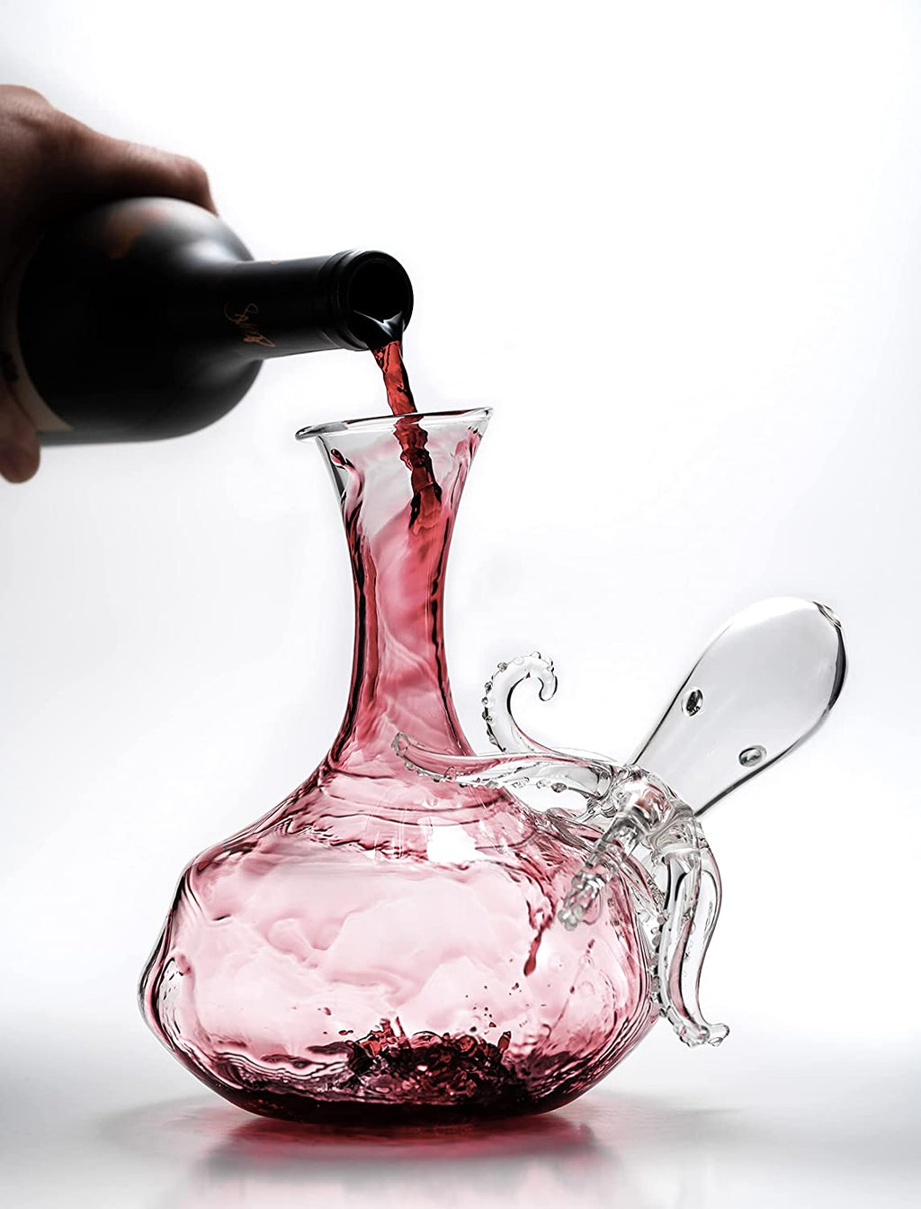 Clear blown glass octopus whiskey decanter with detailed tentacles and integrated pouring spout — view 3