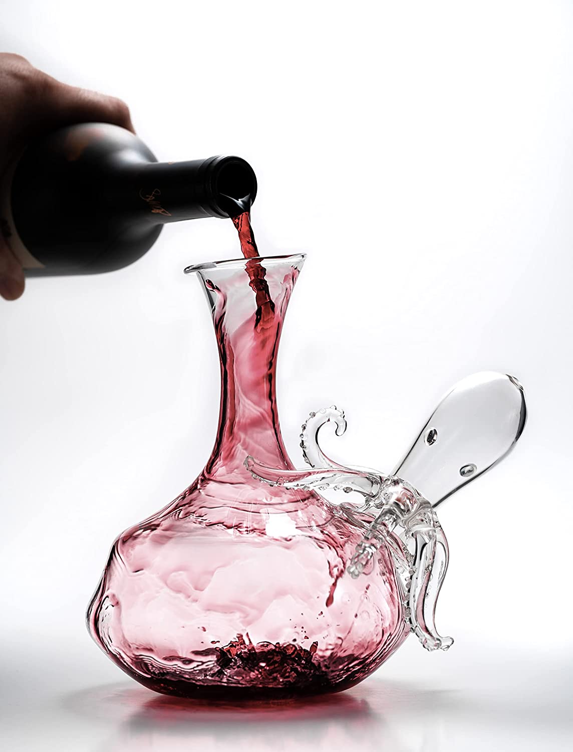 Clear blown glass octopus whiskey decanter with detailed tentacles and integrated pouring spout — view 3