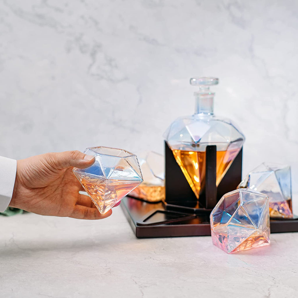 Diamond iridescent whiskey decanter set with two glasses on a mahogany wood stand — view 4