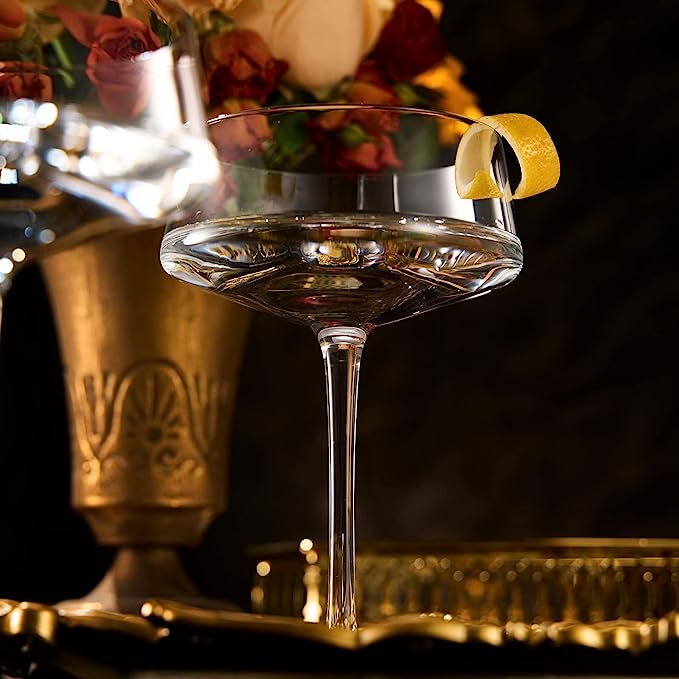 Two luxury clear glass 10oz martini coupes with an elegant silver mixing spoon for home bars — view 3