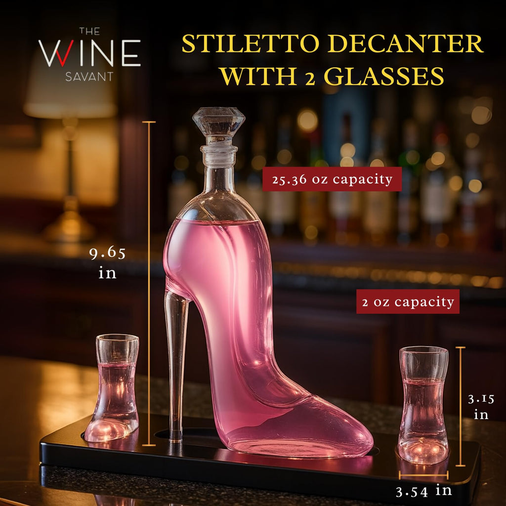 Clear borosilicate glass stiletto high heel whiskey decanter with two mini shoe shot glasses on base — view 2
