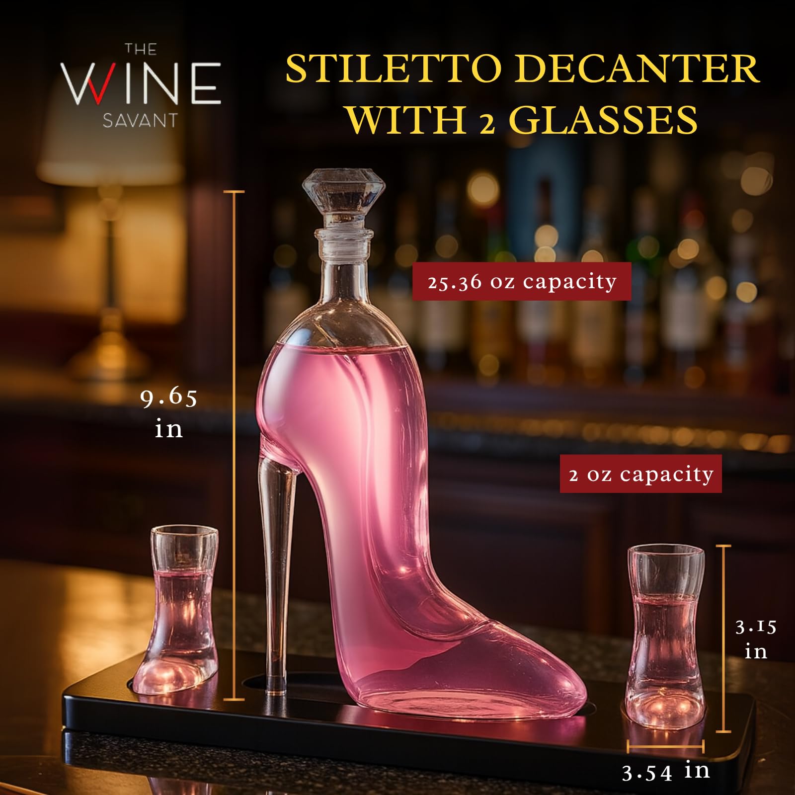 Clear borosilicate glass stiletto high heel whiskey decanter with two mini shoe shot glasses on base — view 2