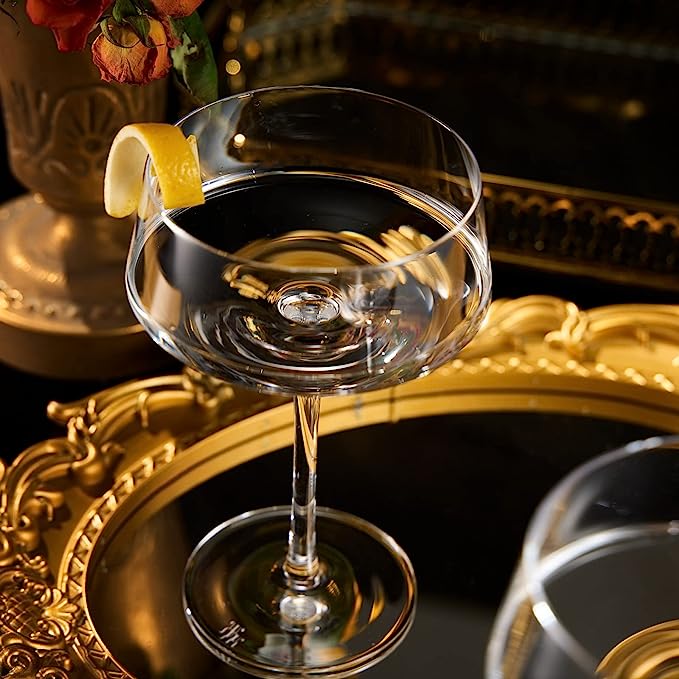 Two luxury clear glass 10oz martini coupes with an elegant silver mixing spoon for home bars — view 4