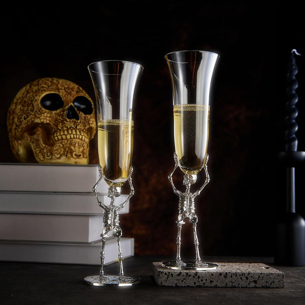 Stemmed skeleton champagne flute set of two in clear glass with intricate bone details — view 2