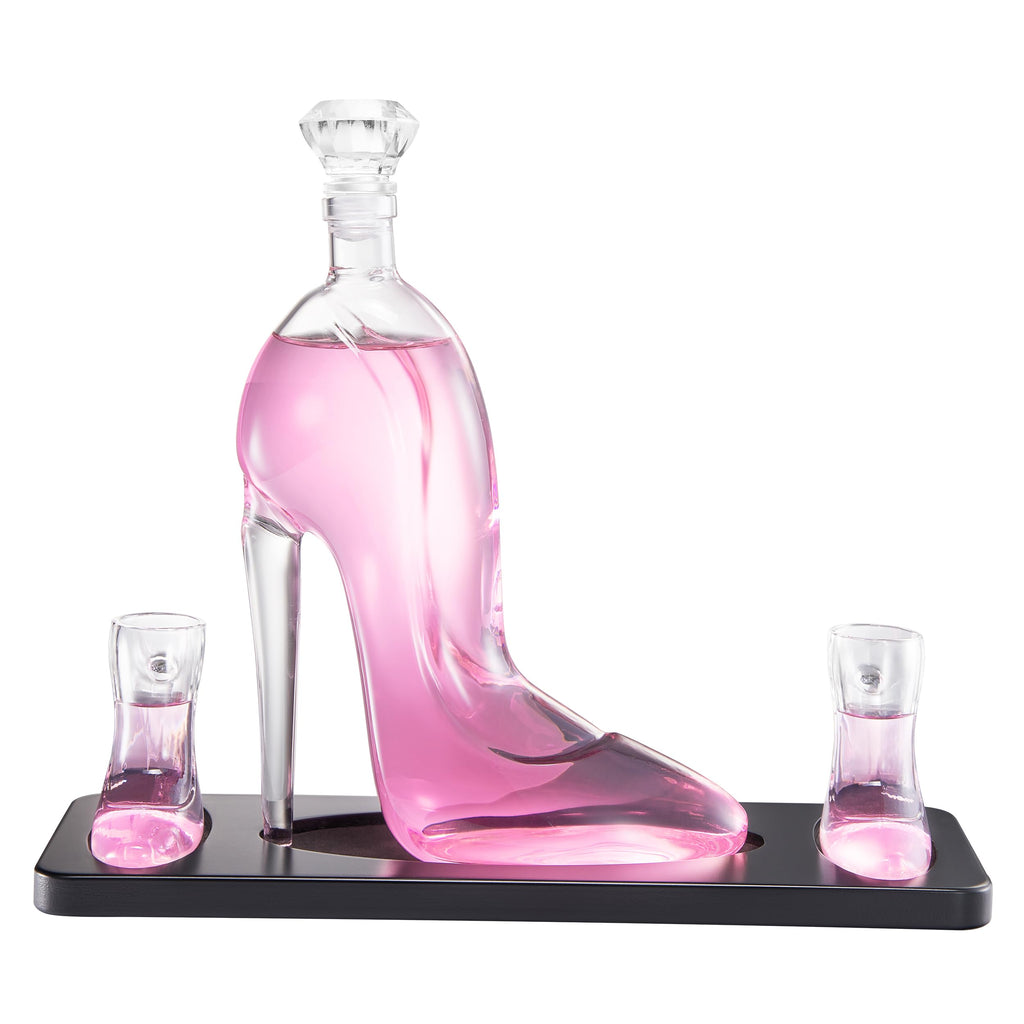 Clear borosilicate glass stiletto high heel whiskey decanter with two mini shoe shot glasses on base