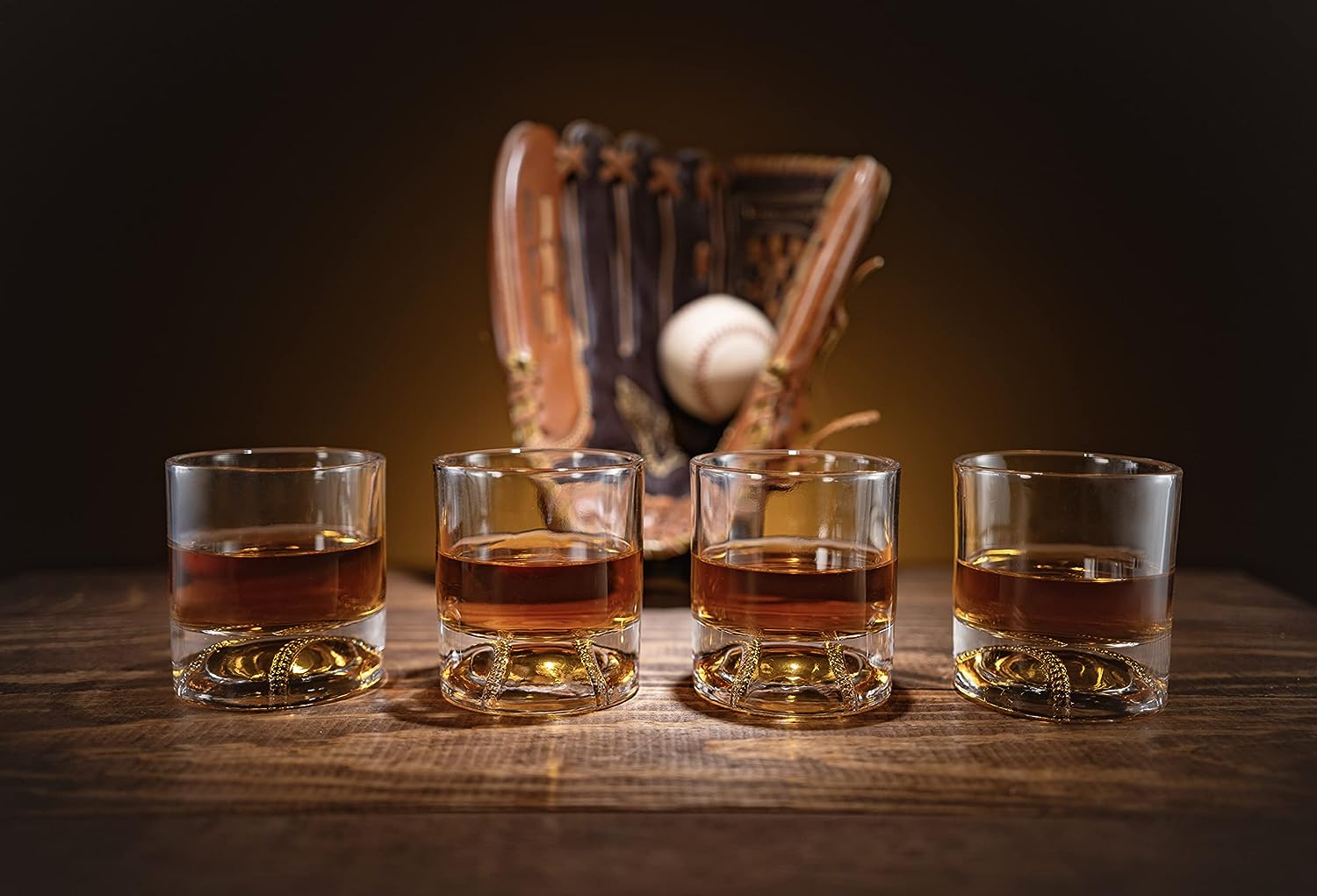 Clear 12oz baseball whiskey glass with a sculpted floating baseball design in the bottom base — view 5