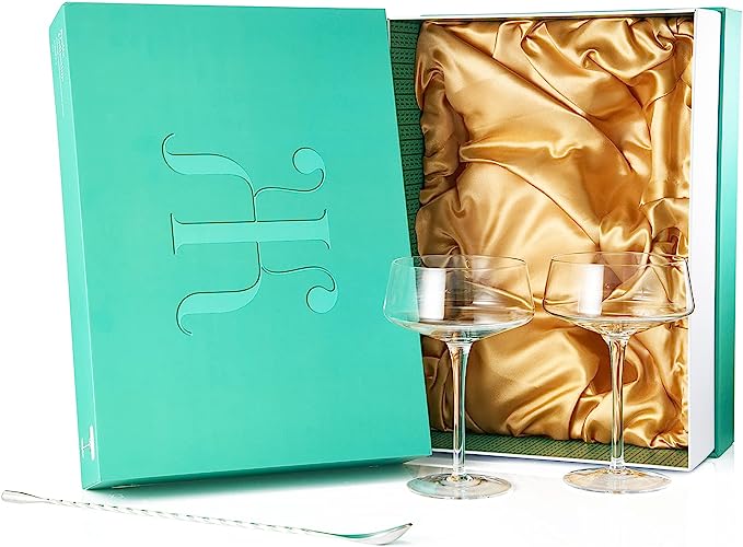 Two luxury clear glass 10oz martini coupes with an elegant silver mixing spoon for home bars — view 5
