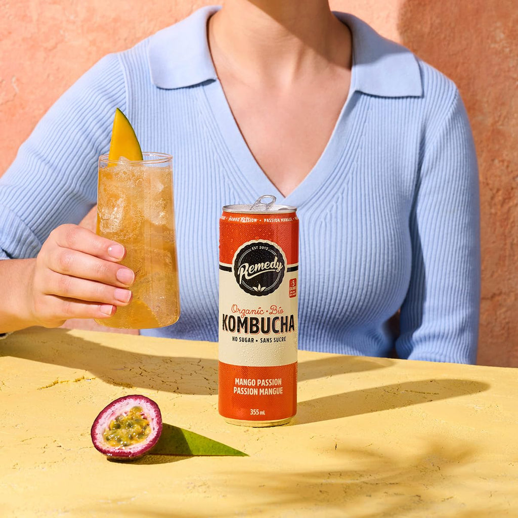 Remedy Mango Passion kombucha pack of twenty four vibrant yellow and orange printed aluminum beverage cans — view 4