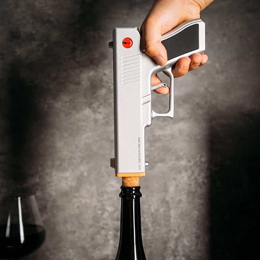 Silver electric pistol wine bottle opener in rechargeable holster dock base — view 4