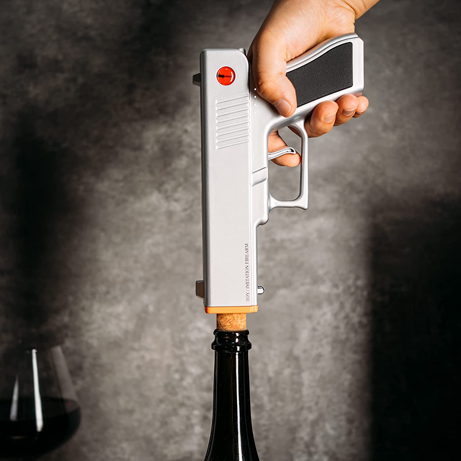 Silver electric pistol wine bottle opener in rechargeable holster dock base — view 4