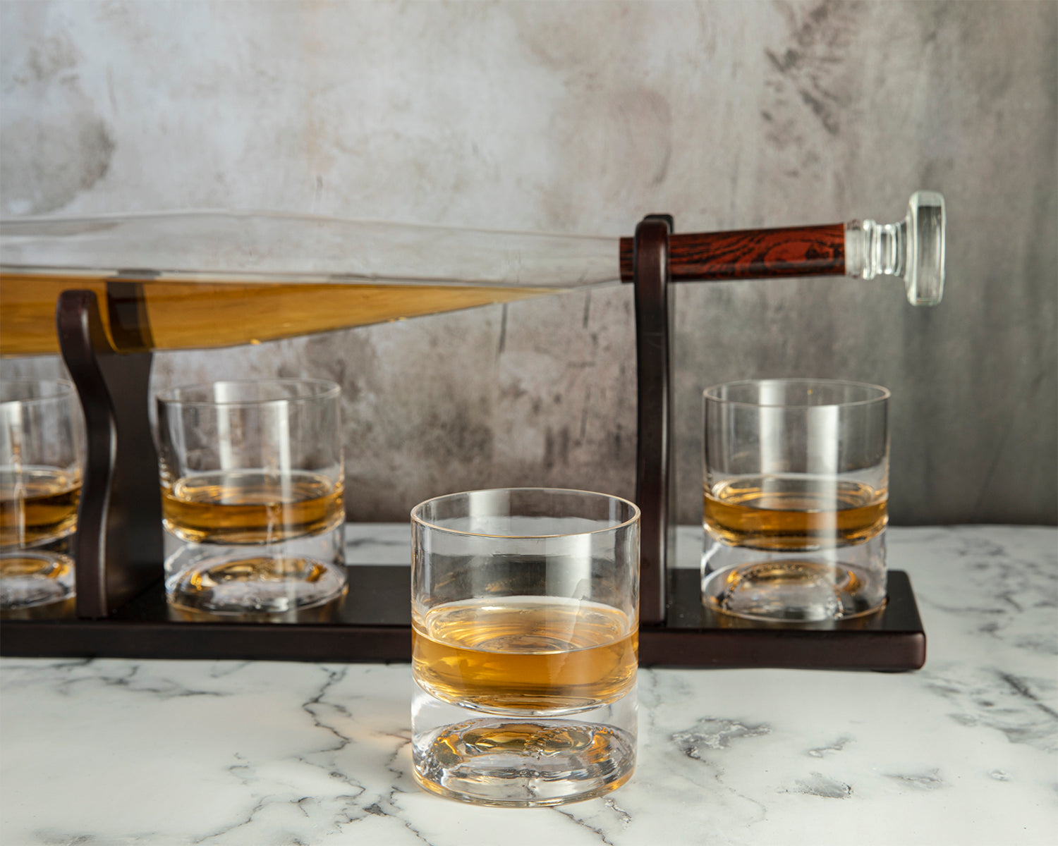 Baseball bat whiskey decanter set with four themed glasses on a rich mahogany wood holder — view 4