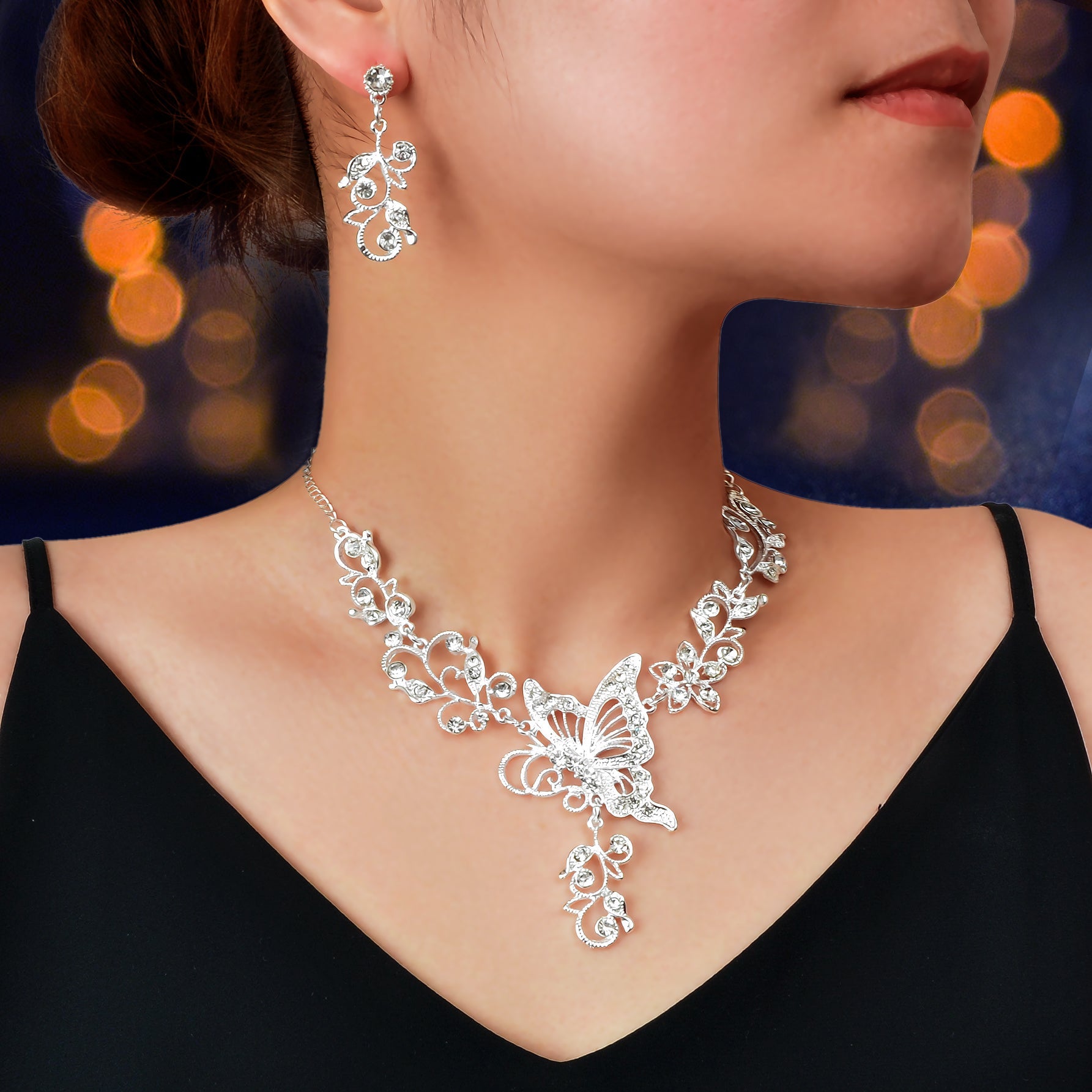 Silver-toned flower and butterfly collar necklace with matching drop earrings elegant anniversary jewelry set