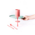 Eco-friendly five-piece plant-based party tableware set including plate, cup, fork, knife, and spoon.