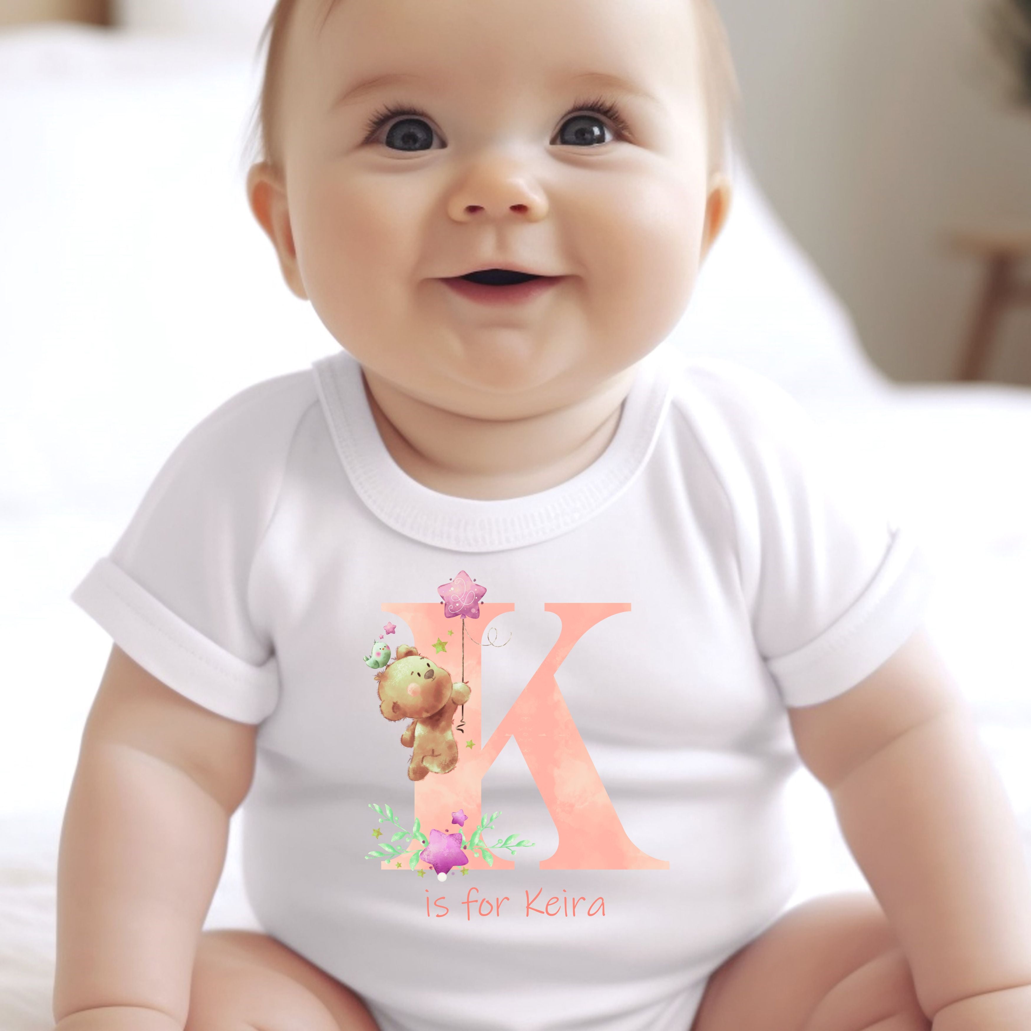 Personalised pink baby outfit featuring teddy bear motifs custom printed initial cotton bib and newborn vest — view 2