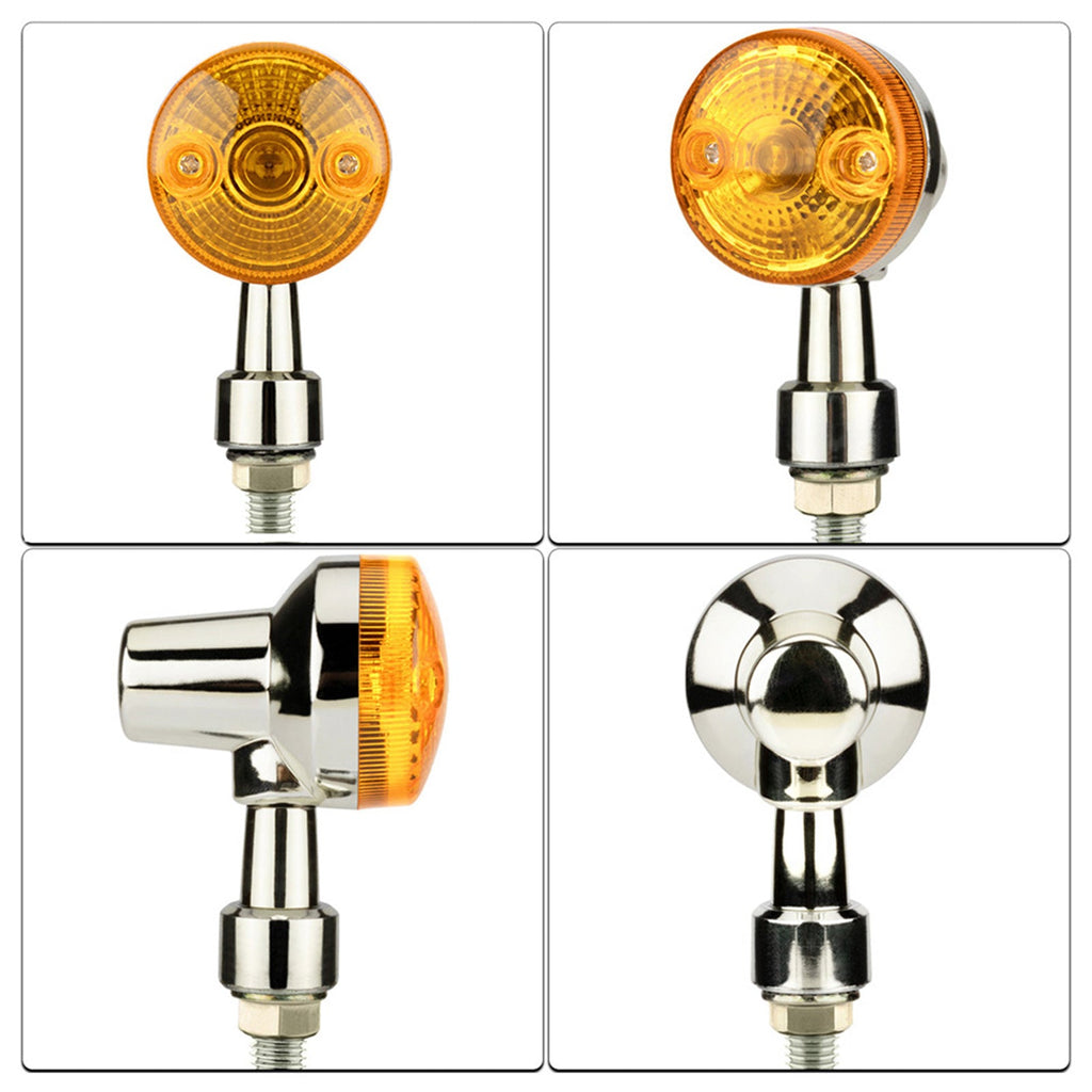 Chrome motorcycle turn signals with bright amber lens and silver housing for custom bike builds. — view 4