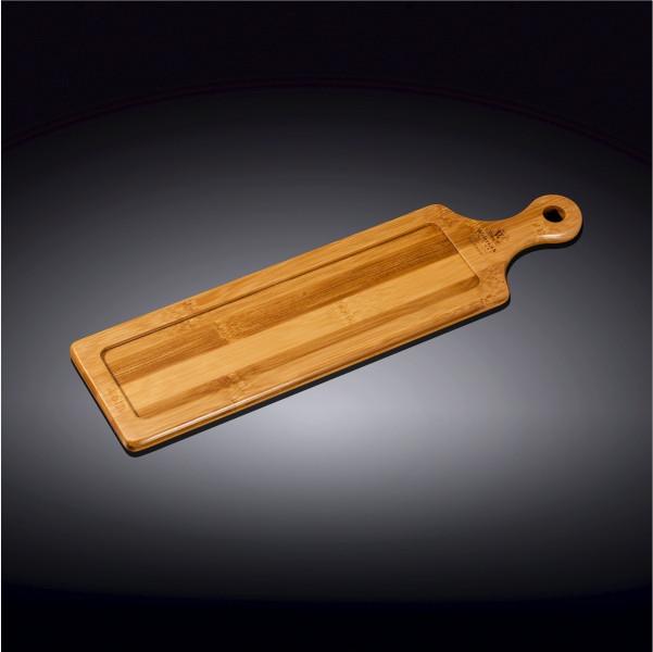 Rectangular natural bamboo serving tray with handle for appetizers and sliders on a table — view 2