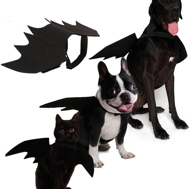 Black felt bat wings dog costume featuring adjustable Velcro straps on a white background