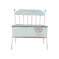 Vintage chair garden planter in cream metal with a square wooden base and built-in drainage