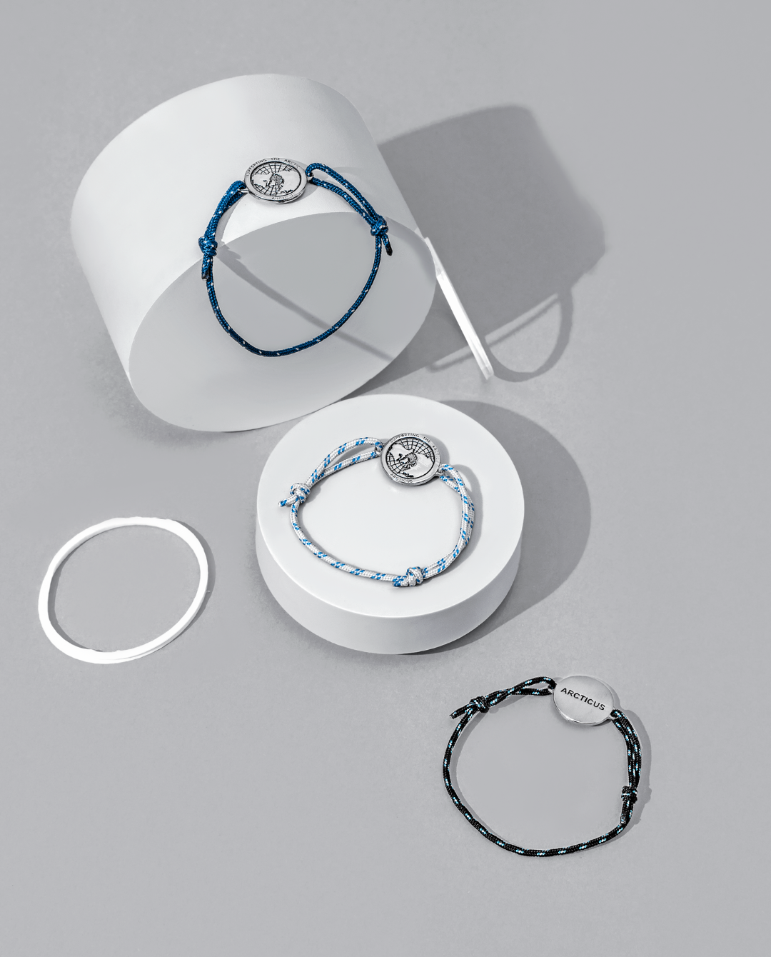 Arctic Circle black rope bracelet with stainless steel map charm and blue lines detail — view 5