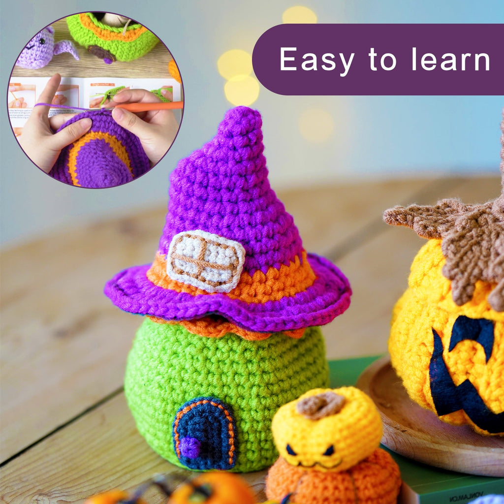 Halloween amigurumi DIY crochet kit featuring a completed miniature witch house, flying bat, and pumpkin — view 2